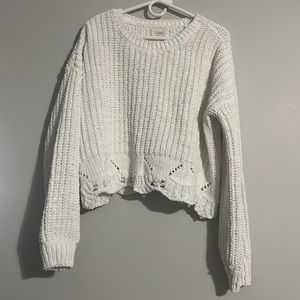 Cropped eyelit sweater.